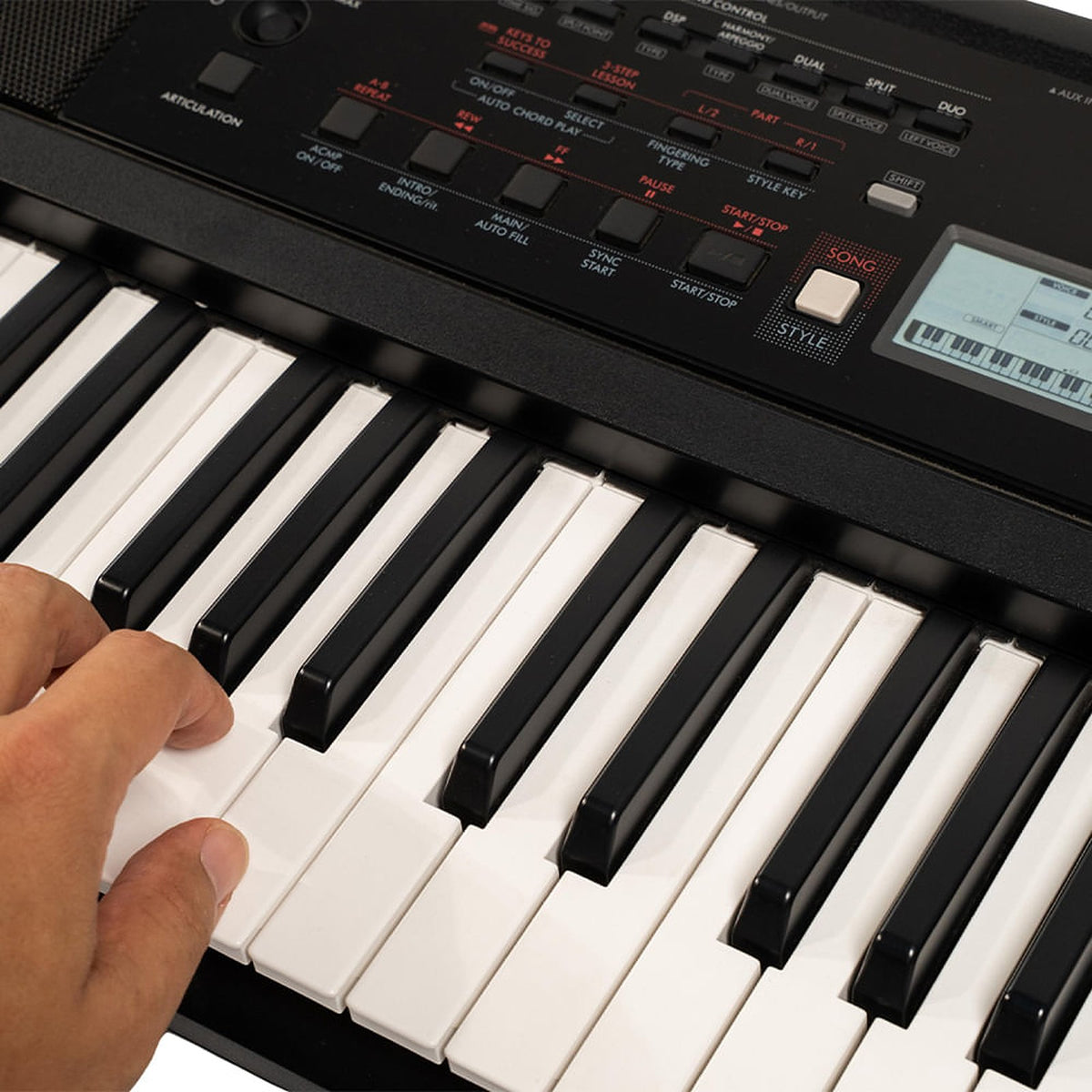 Teclado Yamaha PSR-E383 con adaptador